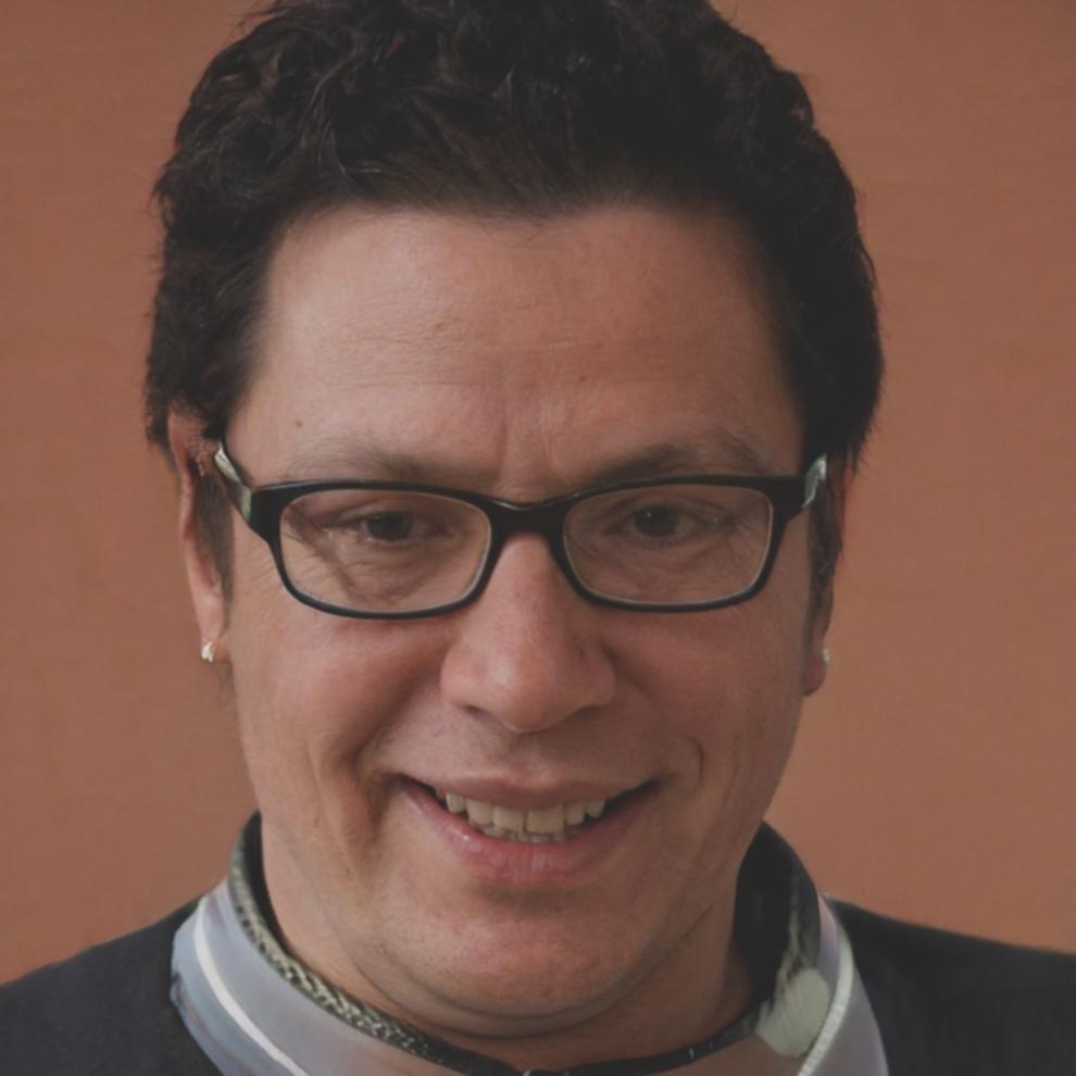 Ritratto di Adriano Moretti, fotografo documentarista